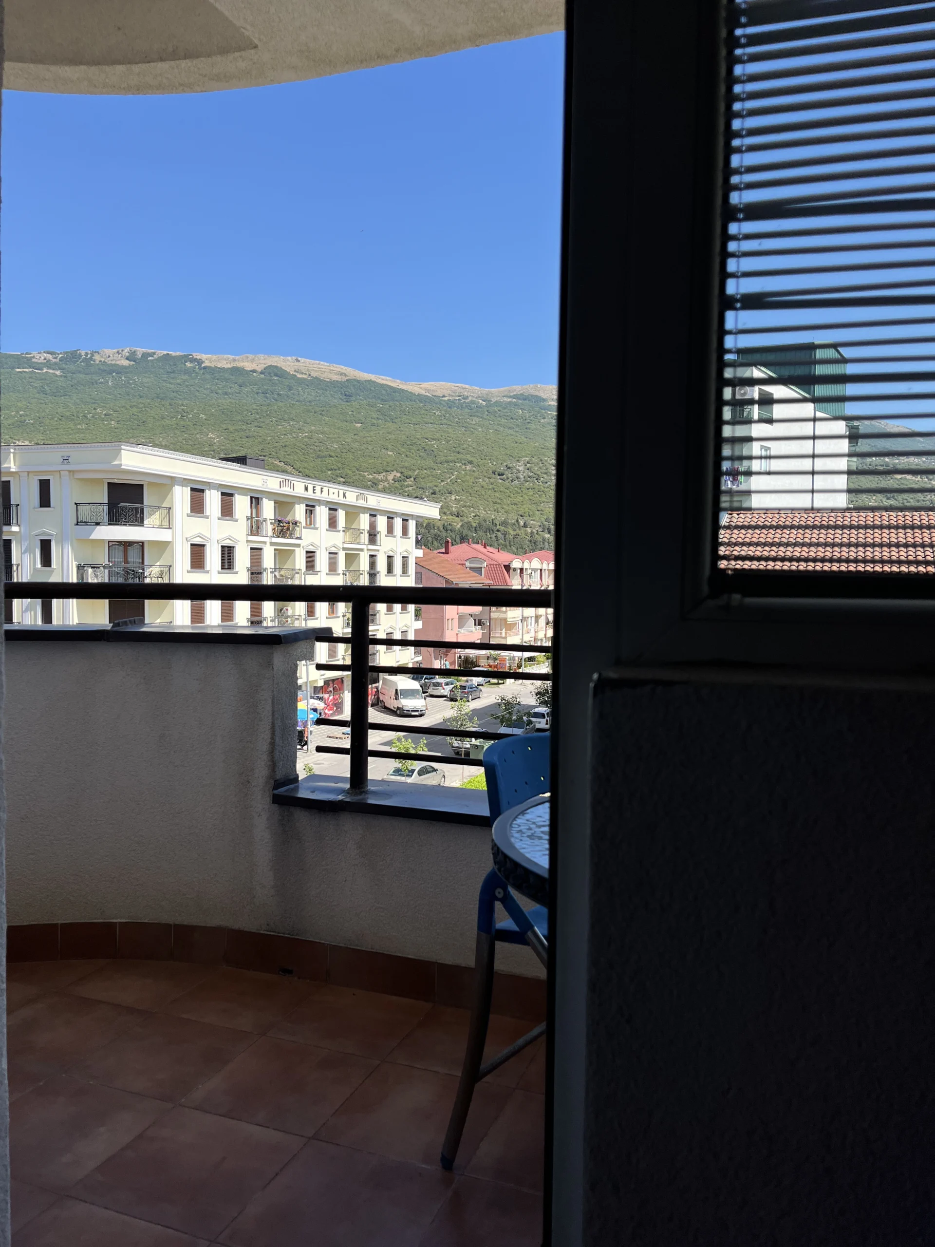 chair in the balcony on a sunny day