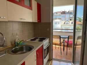 kitchen area and a balcony with a view